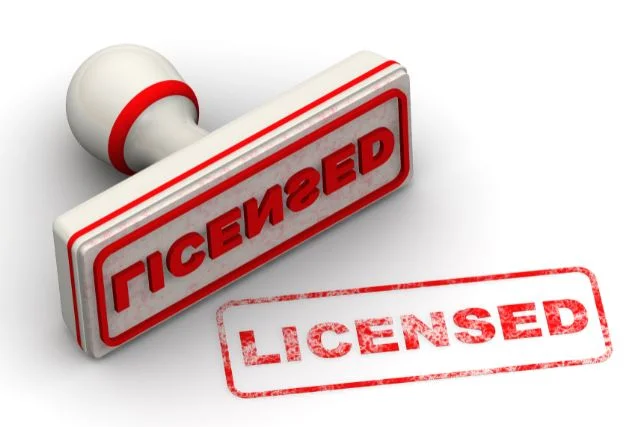 A red licensed stamp in a plain white background.