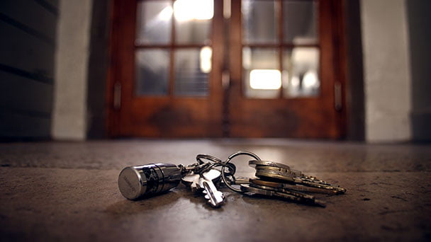 Keys on ground outside of front door