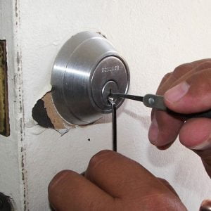 Man PIcking a Door Lock