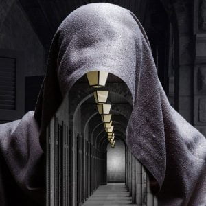 Man Standing Along The Hall - Theft and Security of Your Property